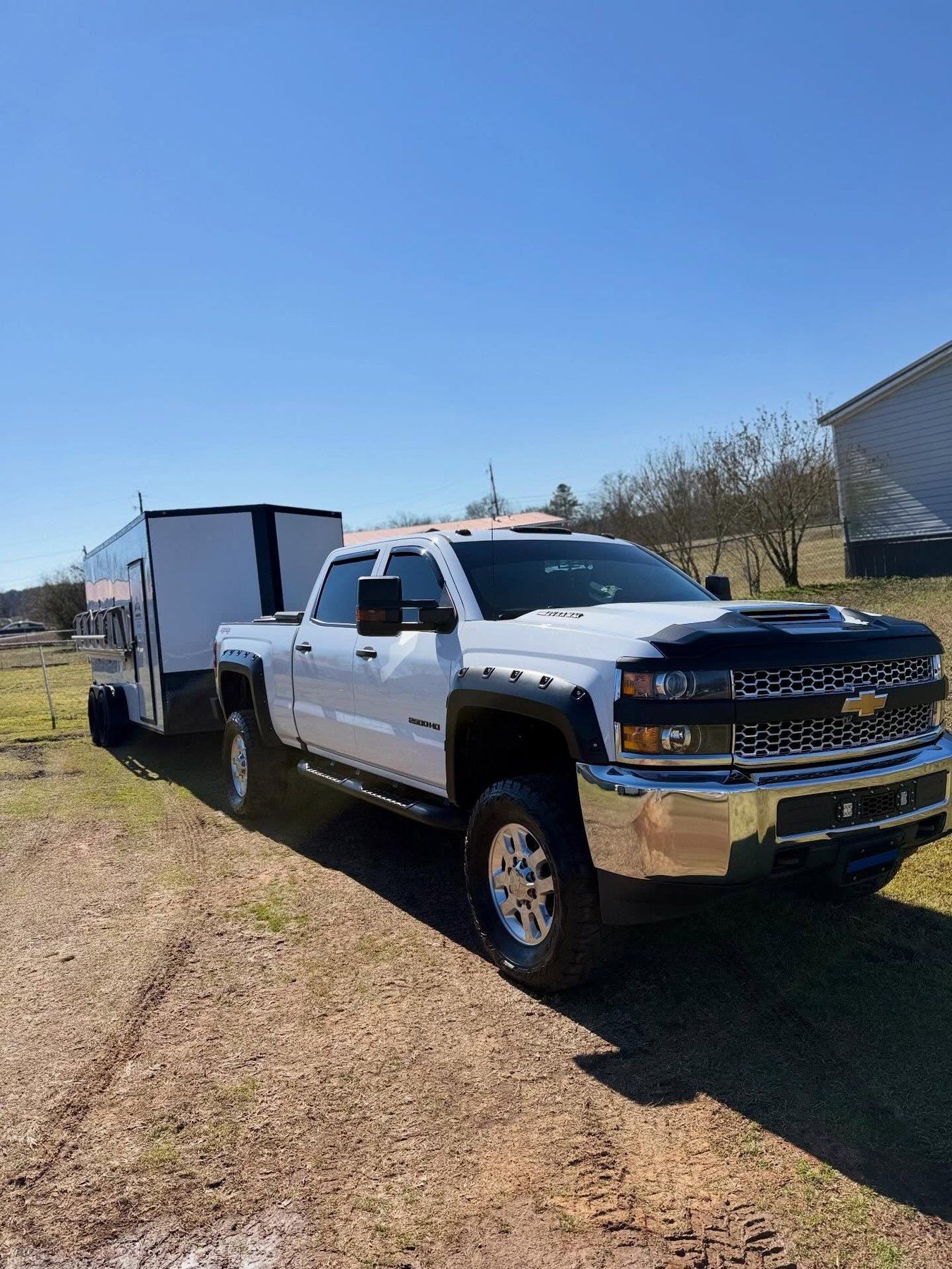 Presidential Detailing truck towing its fully equipped mobile detailing trailer